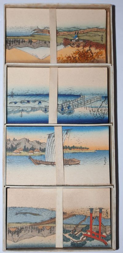 Box of Ninety Place Cards, with four different complete sets of twenty, each set with a small reproduction of a Hiroshiga woodblock scene on one side, the other side, blank for a name to be written, plus a bonus of ten additional cards of that represent an intermediate state of the woodblock printing process for four designs all different than the designs of the complete sets