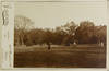 Photograph of 4 women playing lawn tennis