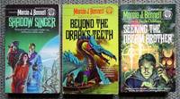 THE NI&#039;LACH SERIES VOLUMES 2, 3 &amp; 4.  2. SHADOW SINGER.  3. BEYOND THE DRAAK&#039;S TEETH.  3. SEEKING THE DREAM BROTHER.  3 BOOKS IN TOTAL. by Bennett, Marcia J.   (M.J.) - 1984