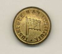 [Pictorial Brass Shank-Back Button]: "Tuskegee N & I Institute" with Embossed Image of a Waving American Flag