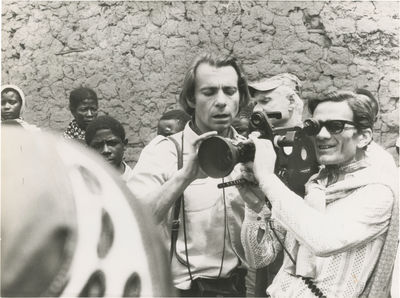 N.p.: N.p., 1971. Vintage borderless reference photograph of director Pier Paolo Pasolini and uniden...