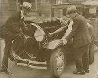 image of Archive of twelve original photographs of remote controlled automobiles, circa 1920s