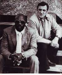 Publicity still of Issac Hayes and Lino Ventura in Tough Guys (1974).