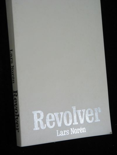 REVOLVER.