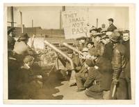 [Wire Photo]: Strikers on Rooftop of Detroit’s Dodge Plant