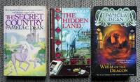 SECRET COUNTRY TRILOGY.  1. THE SECRET COUNTRY.  2. THE HIDDEN LAND.  3. THE WHIM OF THE DRAGON.  3 VOLUME SET.