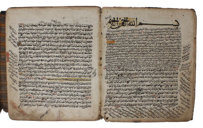 Arabic manuscript on cream paper, containing: …
