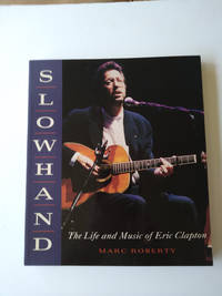 Slowhand: The Life and Music of Eric Clapton. [paperback].