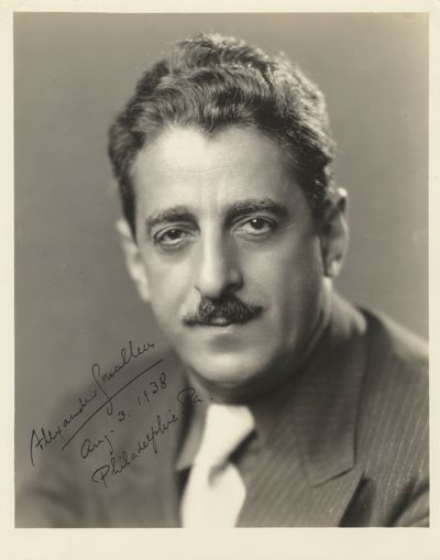 Fine head-and-shoulders portrait of the noted American conductor. Signed in full