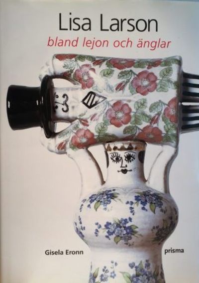 Lisa Larson bland lejon och änglar.