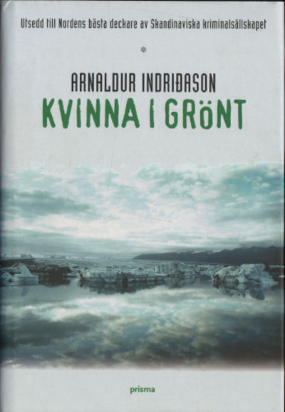 KVINNA I GRÖNT.