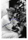 A Herman Wouk Signed Photo With His German Shepherd