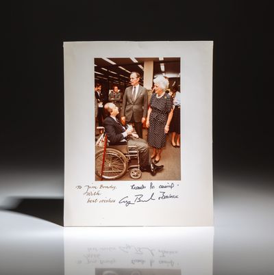 White House Photograph: George H.W. Bush with White House Press Secretary, James Brady