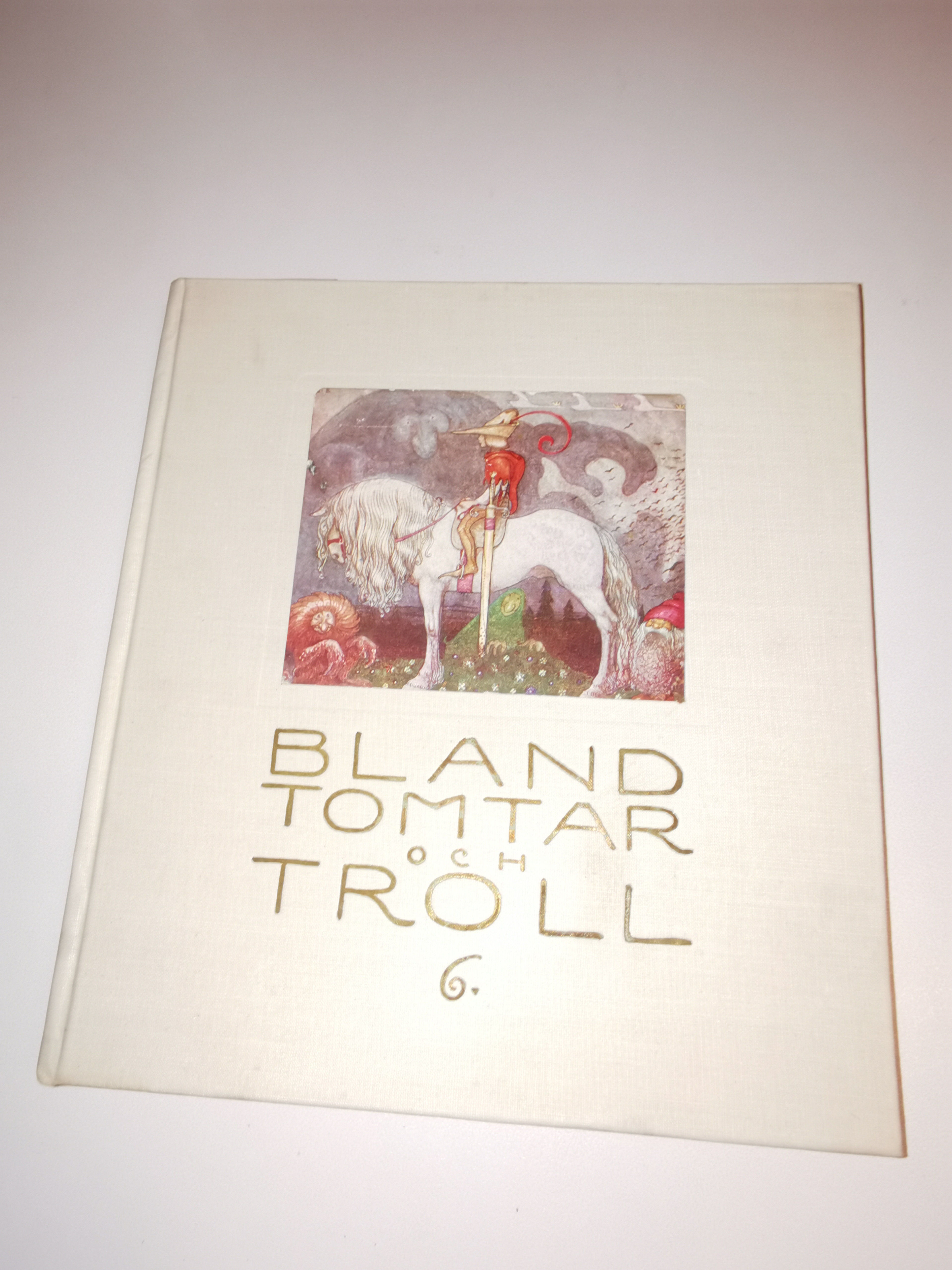 Bland Tomtar Och Troll by John Bauer | White cloth stamped in gold