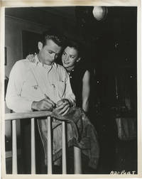 Rebel Without a Cause (Original photograph of James Dean and Natalie Wood on the set of the 1955 film) by James Dean (starring); Nicholas Ray (director); Robert Lindner (book); Stewart Stern, Irving Shulman (screenwriters); Natalie Wood, Dennis Hopper, Sal Mineo (starring) - 1955