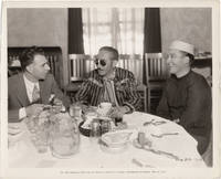 Original photograph of Adolphe Menjou, Bing Crosby, and Wesley Ruggles eating lunch in the Paramount commissary