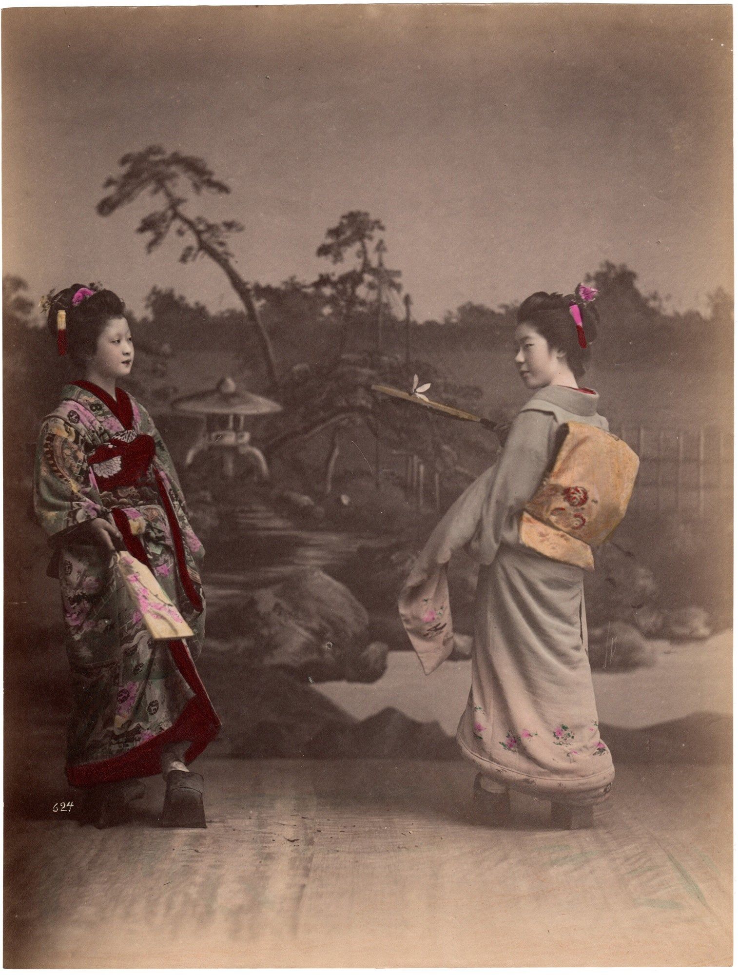 Hanetsuke Japan – Two young women playing hanetsuki (badminton/battledore ...