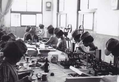 [Photographs of Factory Workers and Processes]