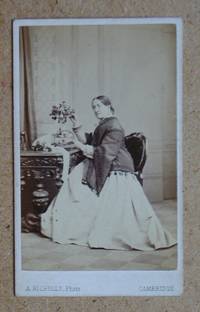Carte De Visite: Studio Portrait of a Seated Lady with Flowers.