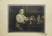 Portrait Photograph of President Getulio Vargas of Brazil (1882-1954) seated at his desk
