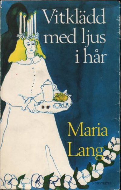 VITKLÄDD MED LJUS I HÅR.