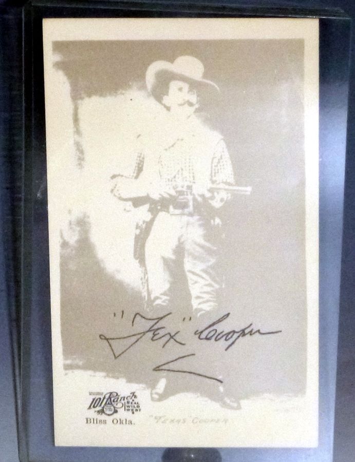 A "Tex" Cooper Signed photograph Postcard,, 101 Ra