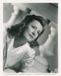 Four original publicity photographs of Irene Dunne