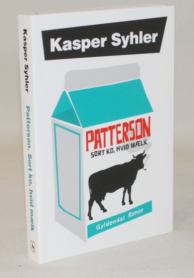 Patterson - sort ko, hvid mælk.
