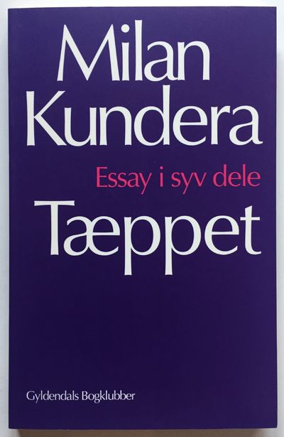 Tæppet.