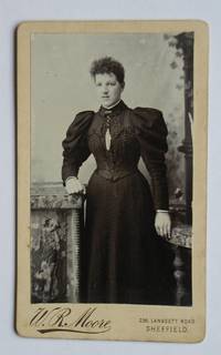 Carte De Visite Photograph: Portrait of a Finely Dressed Young Woman. by W. R. Moore