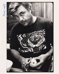 Original photograph of John Irving peeling an apple, circa 1980s