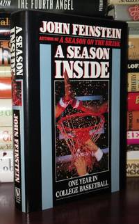 A SEASON INSIDE One Year in College Basketball by John Feinstein - First Edition; First Printing - 1988 - from Rare Book Cellar (SKU: 81193)